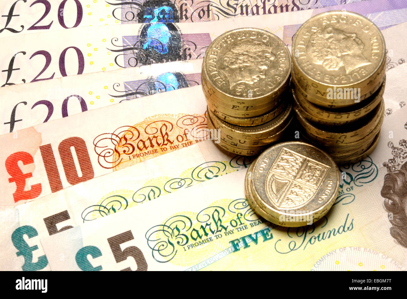 Valuta britannica - pound delle monete e delle banconote Foto Stock