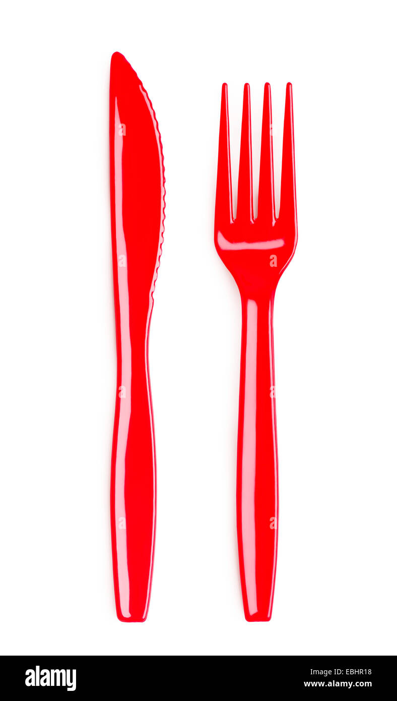Rosso in plastica forchetta e coltello su sfondo bianco Foto Stock