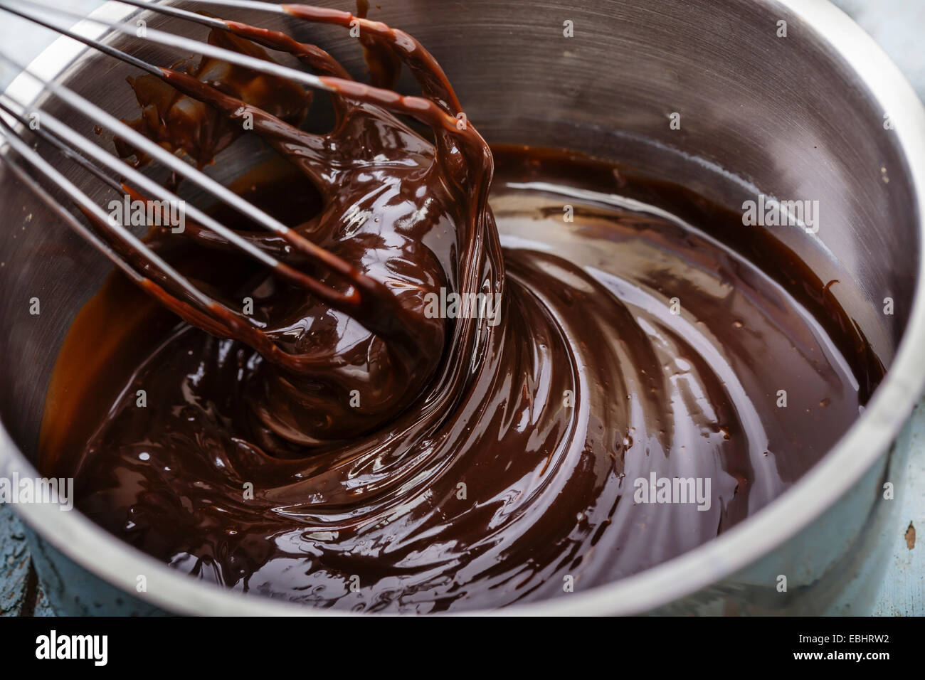 Il cioccolato liquido in una padella Foto Stock