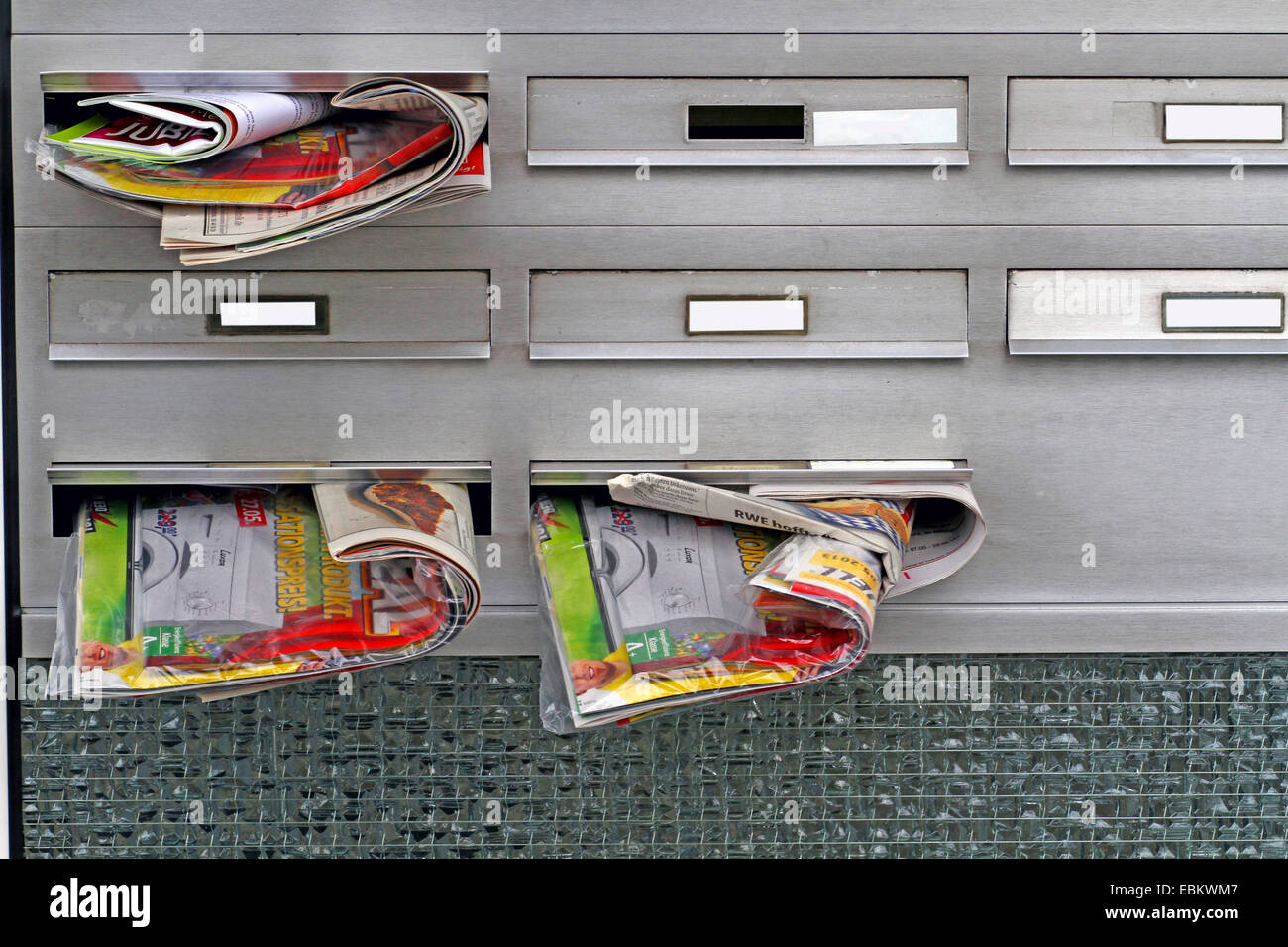 Pubblicità handout in postboxes, Germania Foto Stock