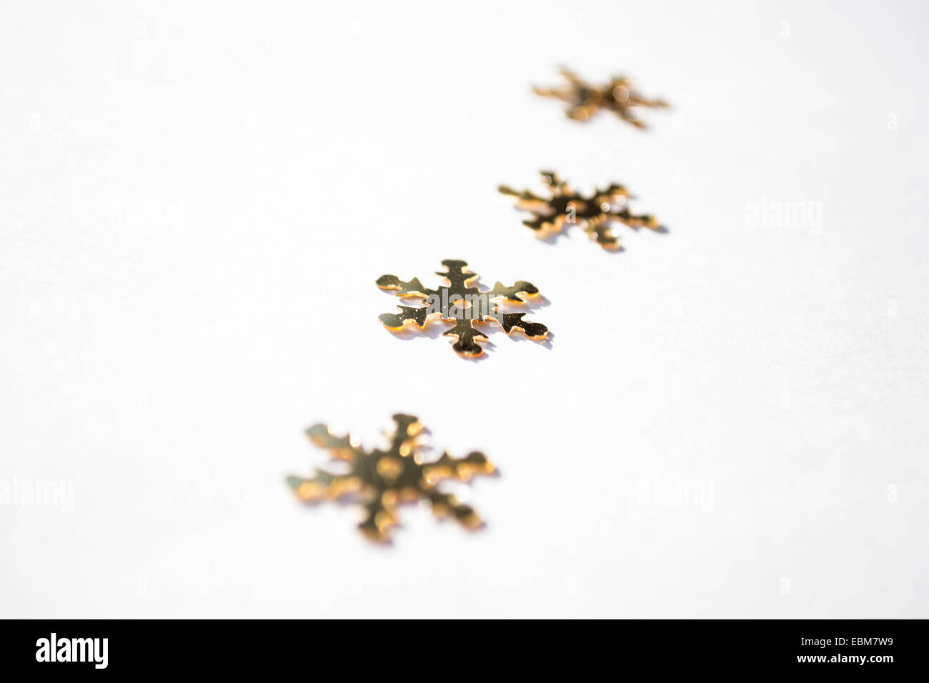 Golden coriandoli di fiocchi di neve Foto Stock