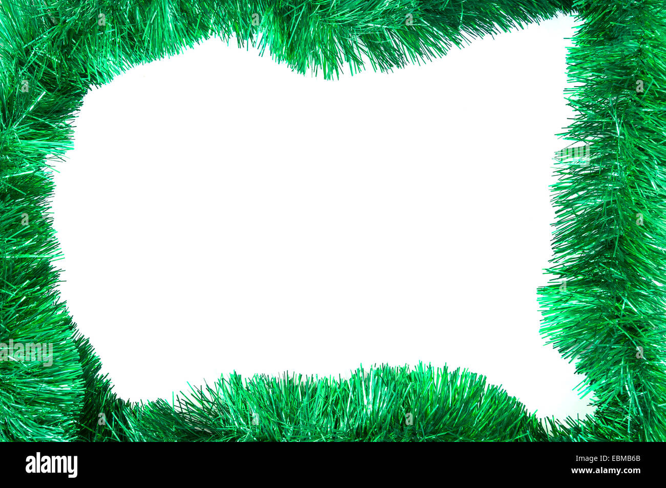 Verde ghirlanda di Natale telaio isolato su sfondo bianco Foto Stock