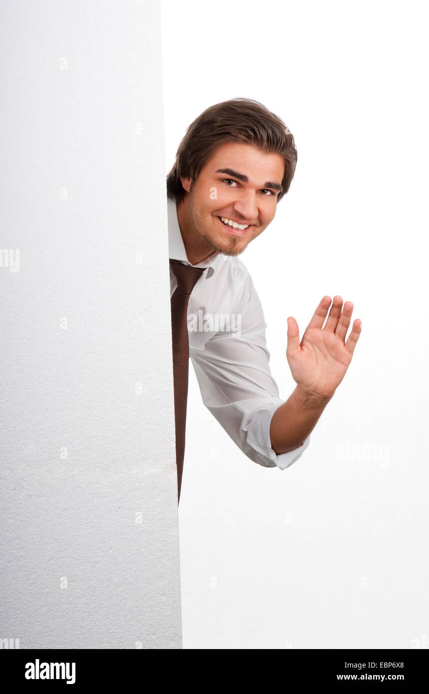 Imprenditore con un bianco pannello vuoto sventolare, Germania Foto Stock