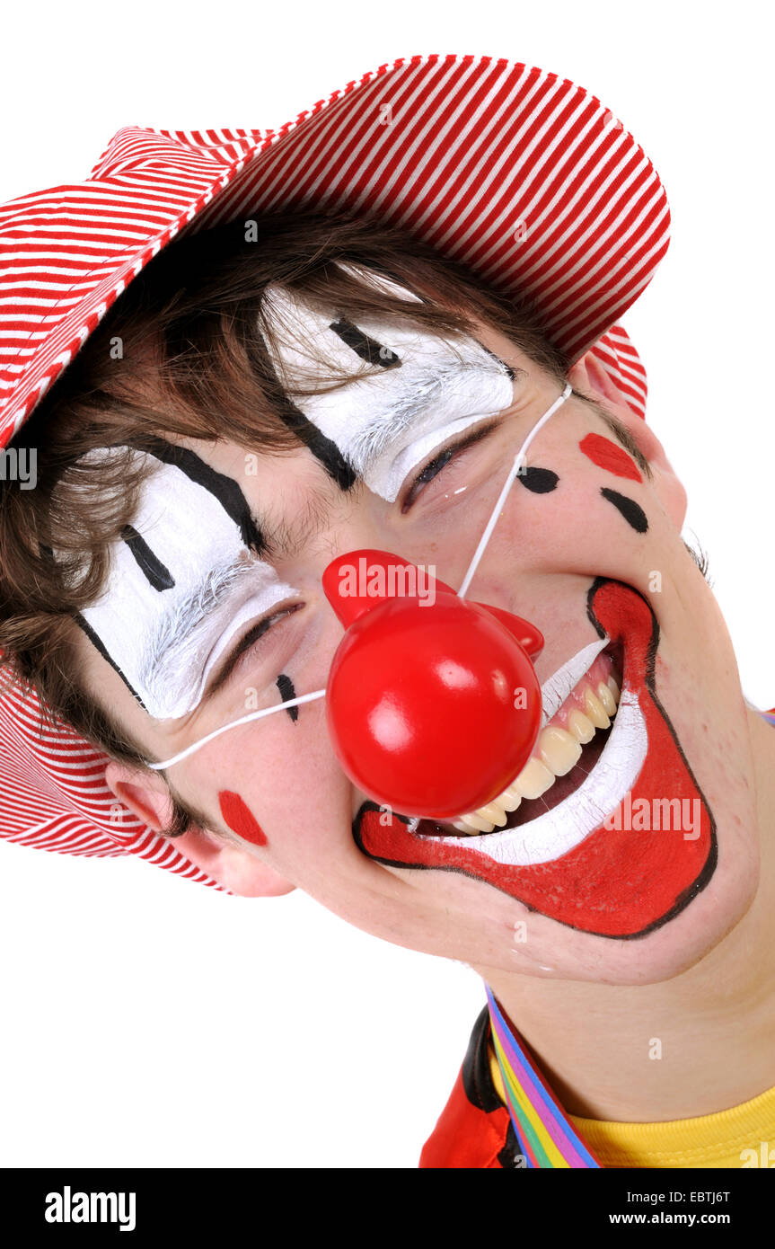 Ragazzo adolescente vestito come un clown, ritratto Foto Stock