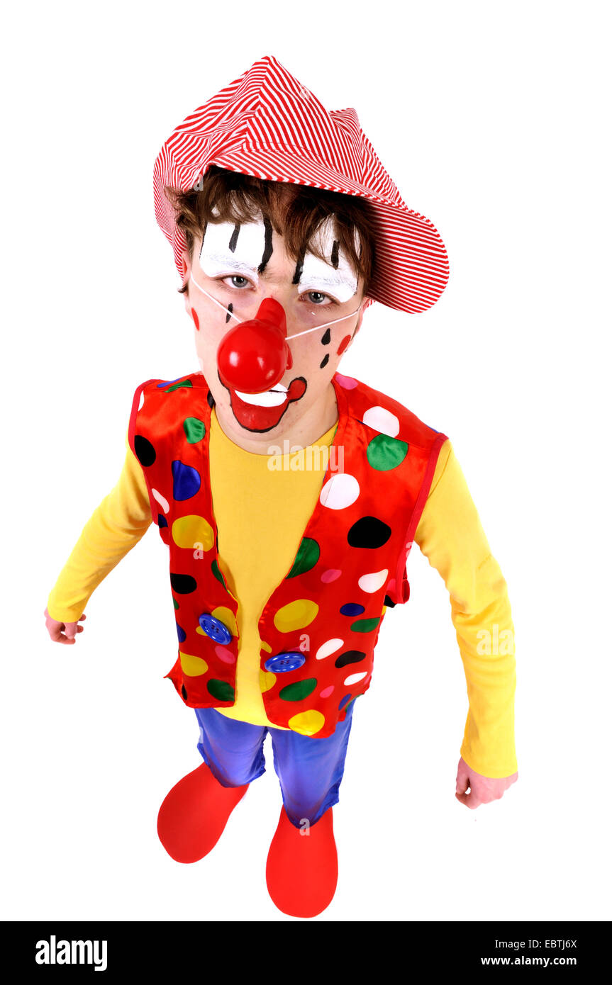 Ragazzo adolescente vestito come un clown Foto Stock