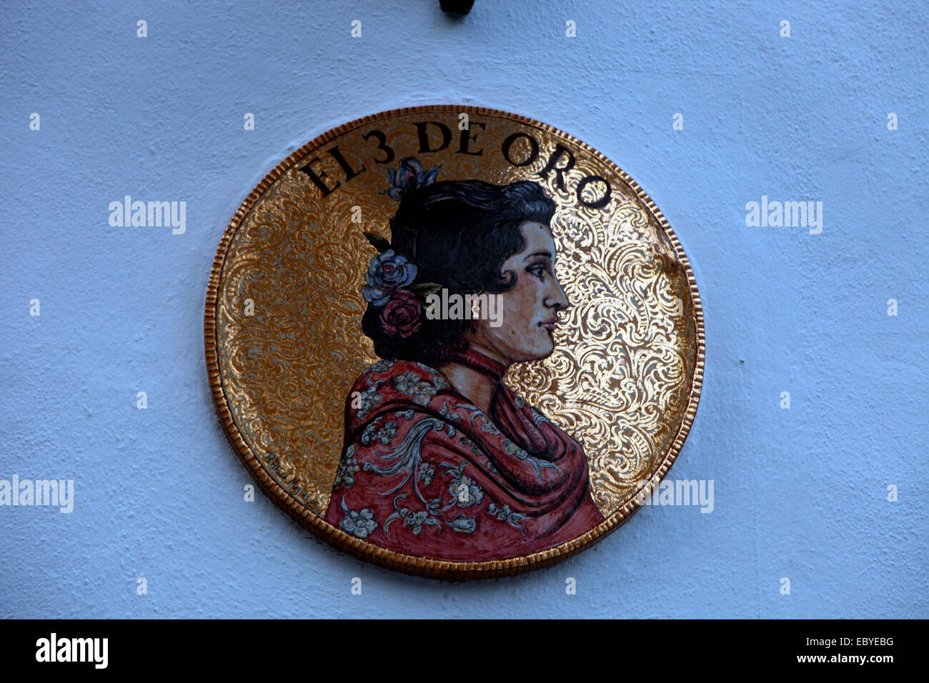 El 3 de Ora restaurant sign in Siviglia. Foto Stock