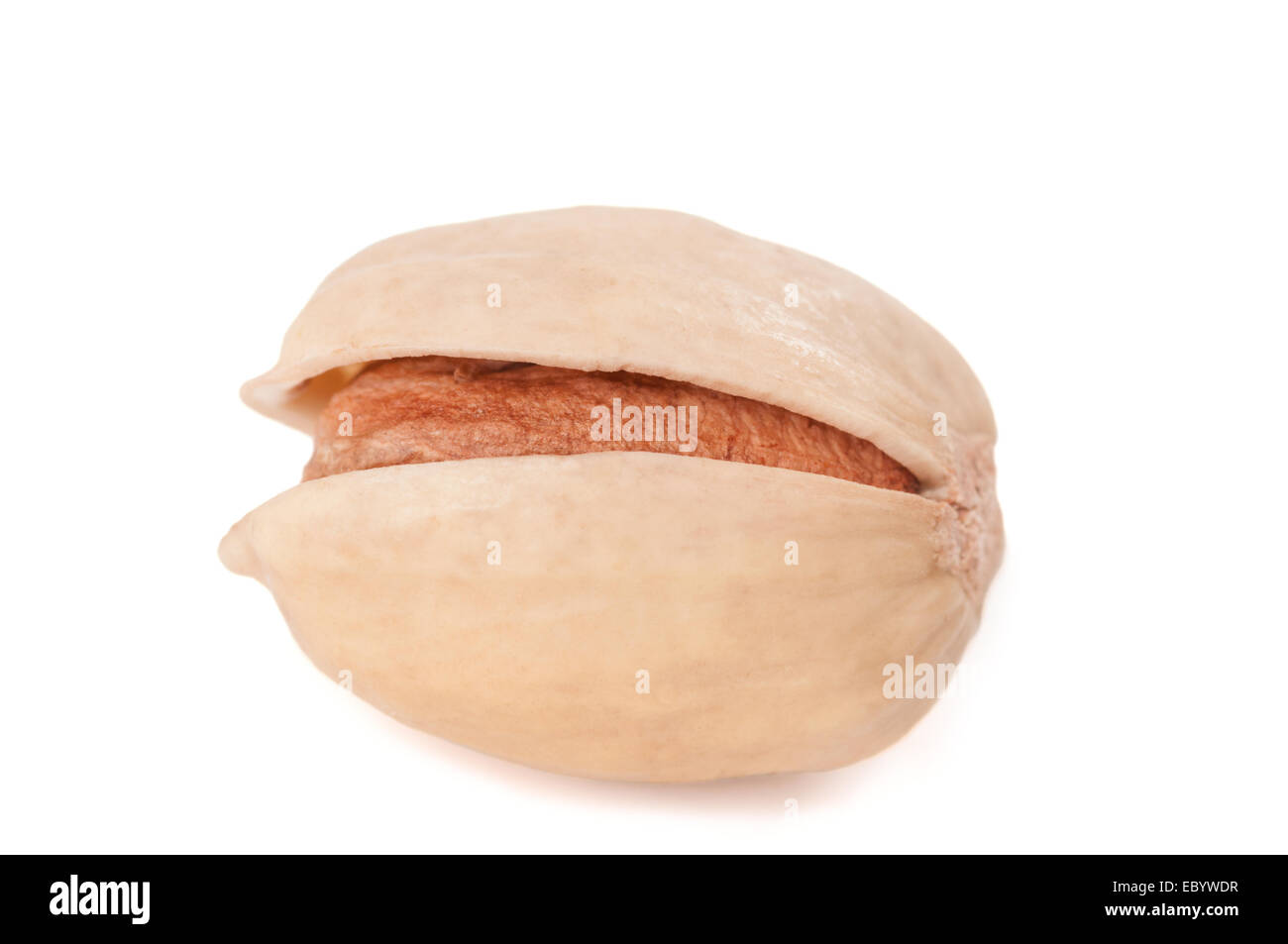 Close-up di un pistacchio isolato su bianco Foto Stock