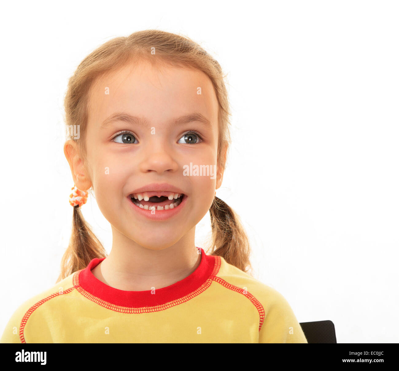 Bambina senza denti superiori Foto stock - Alamy