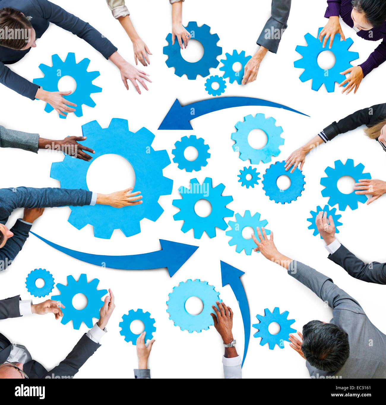 Multietnica la gente di affari con i simboli del lavoro di squadra Foto Stock