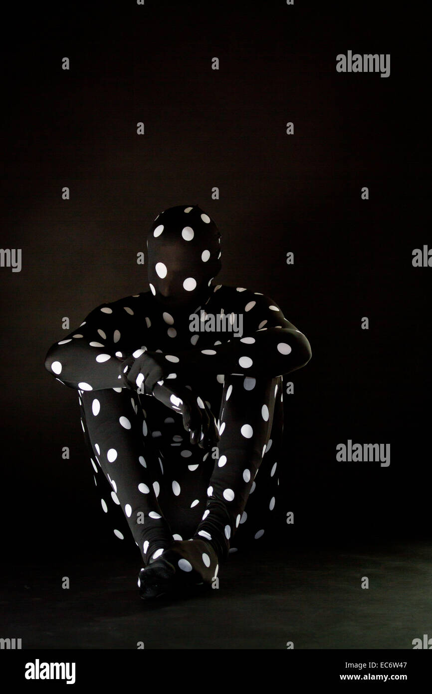 Anonimo persona in Morphsuitcostume Foto Stock