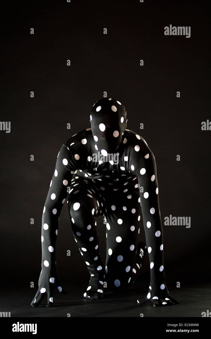 Anonimo persona in Morphsuitcostume Foto Stock