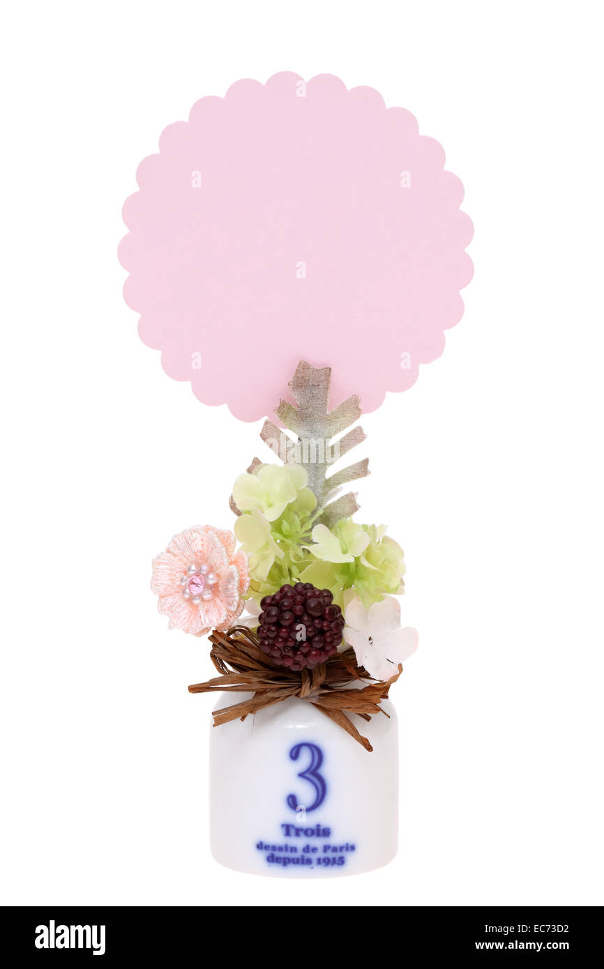 Il fermo che fissa la scheda vuota con decorazione a mano Foto Stock