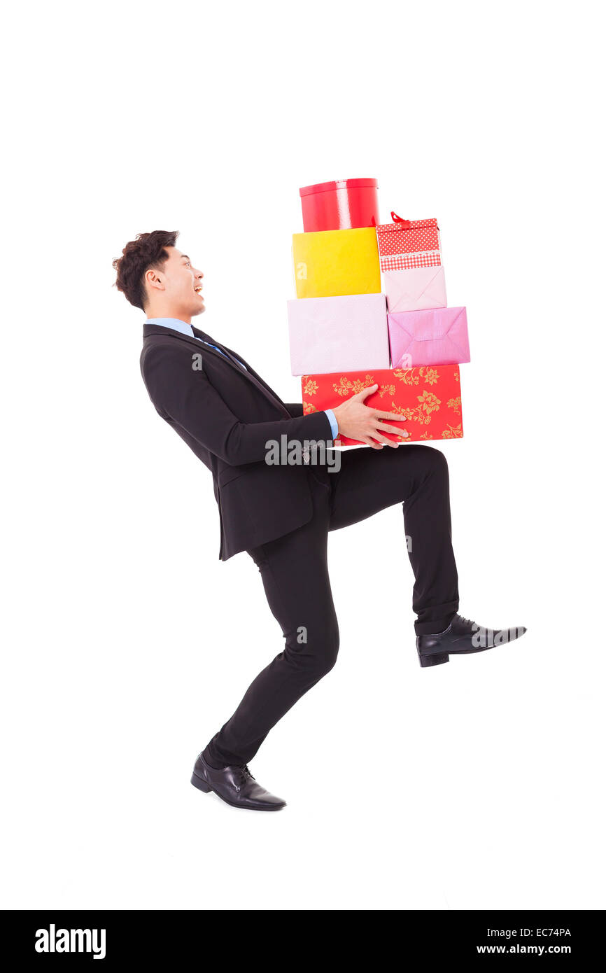 Happy businessman di attesa con confezione regalo Foto Stock