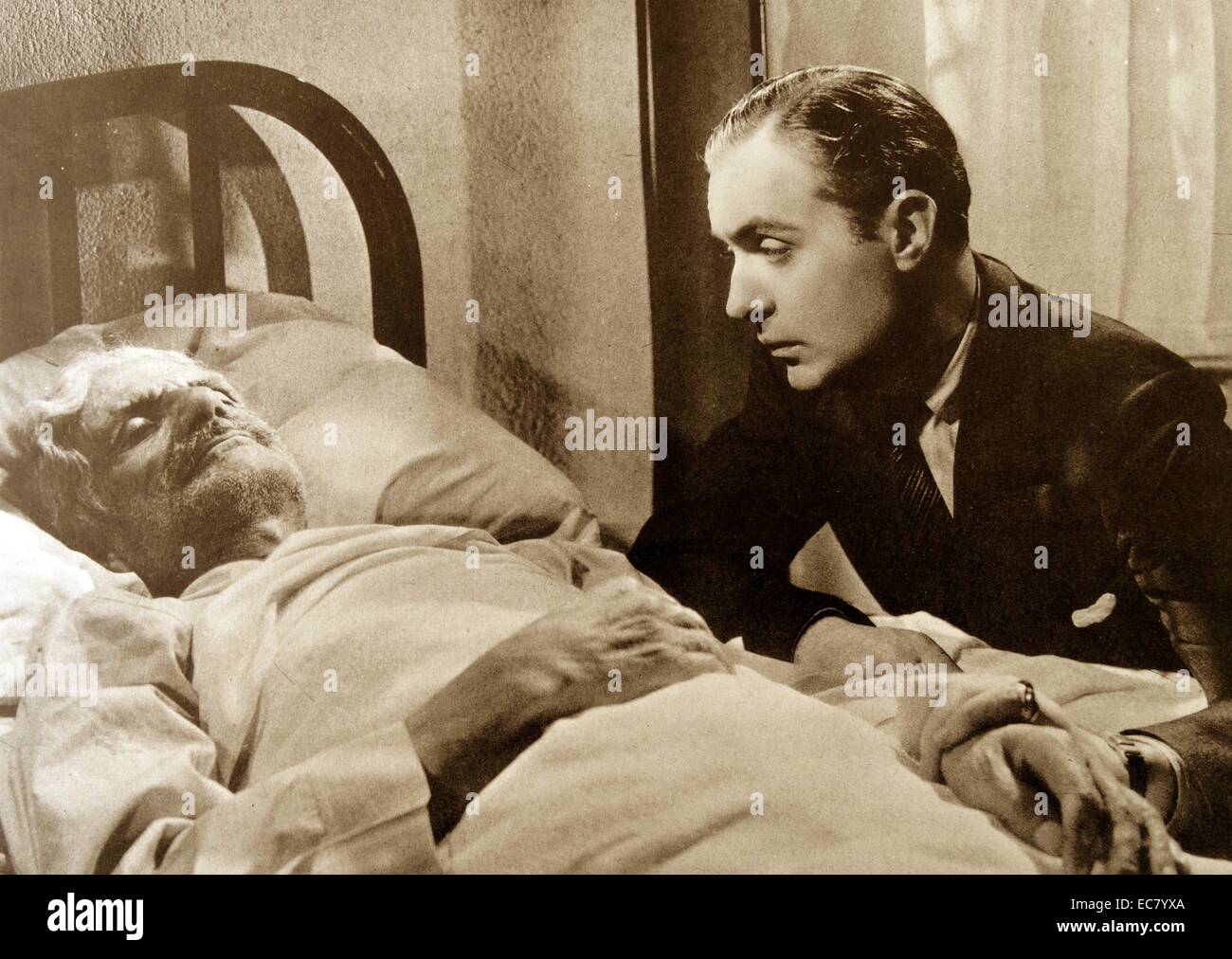 Mondi privati, 1935, è stato il primo film americano di drammi della malattia mentale. Il suo psichiatra Charles Boyer comfort un morente paziente araba pronunciando alcune parole a lui nella sua propria lingua. Foto Stock