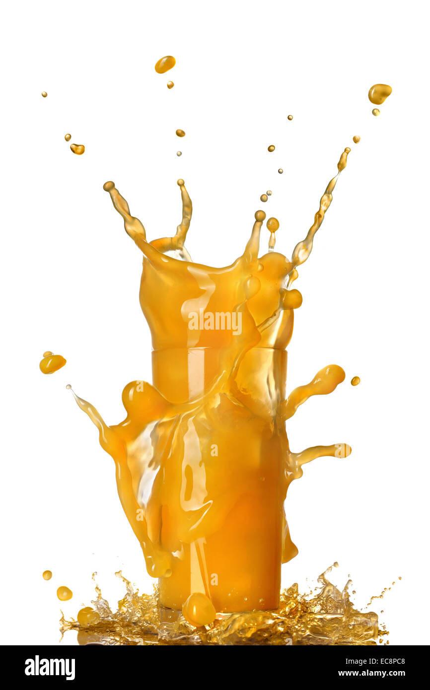 Succo di arancia splash in vetro isolato su bianco Foto Stock