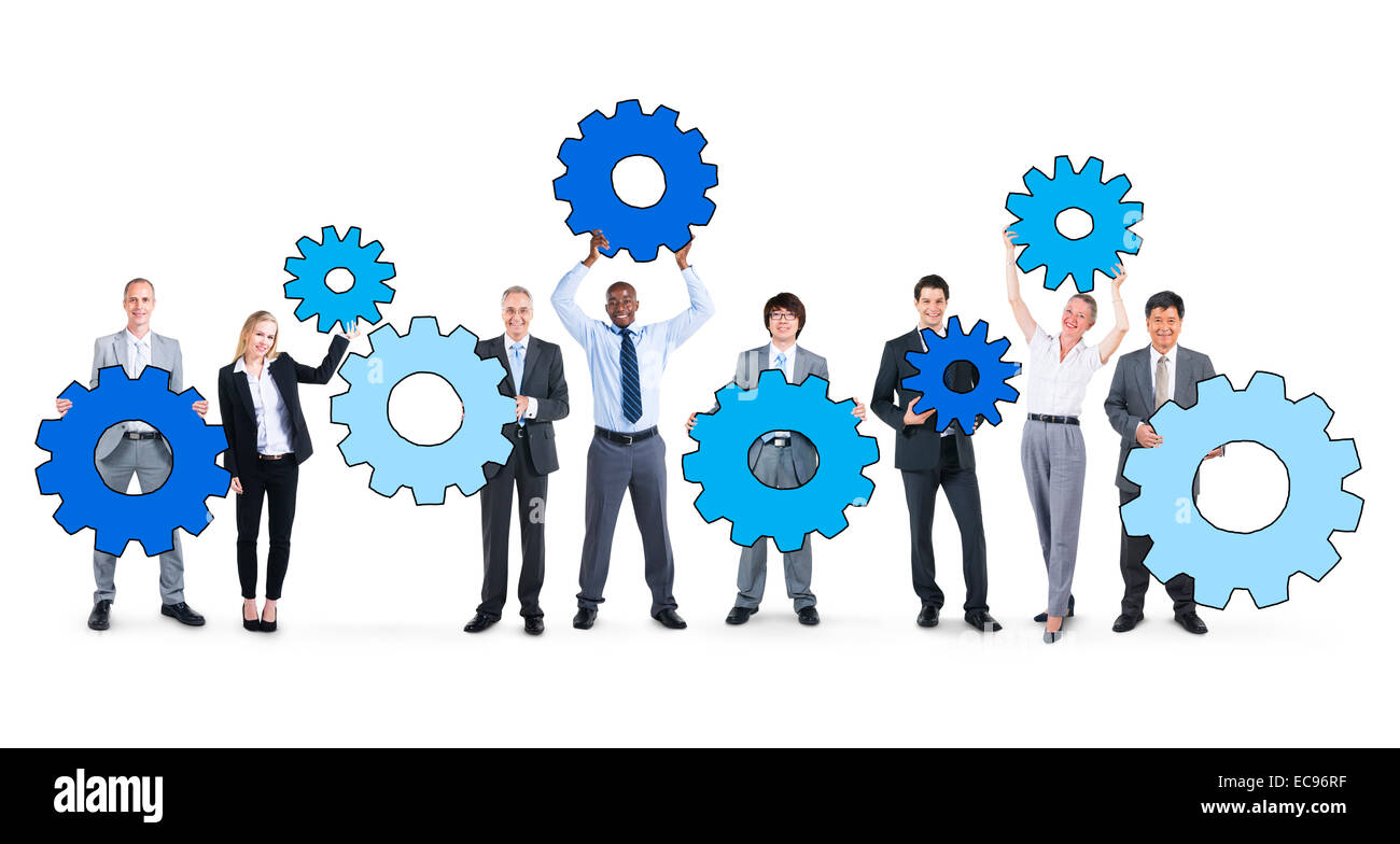 La gente di affari tenendo i simboli di marcia Foto Stock