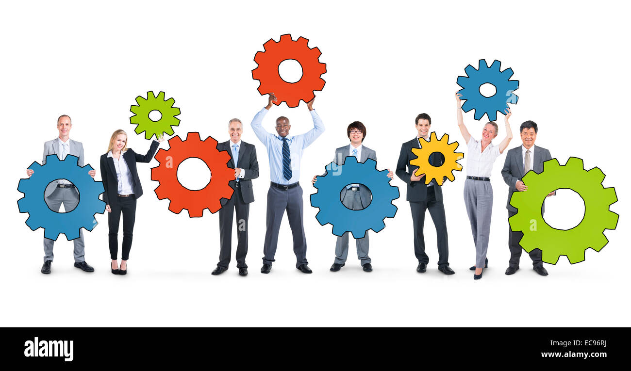 La gente di affari tenendo i simboli di marcia Foto Stock