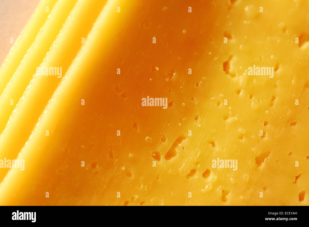 Fette di formaggio fresco come sfondo Foto Stock