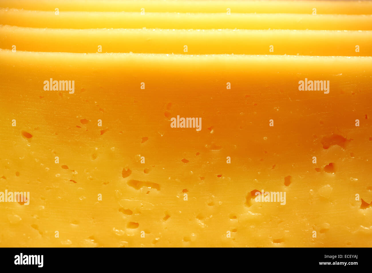 Fette di formaggio fresco come sfondo Foto Stock