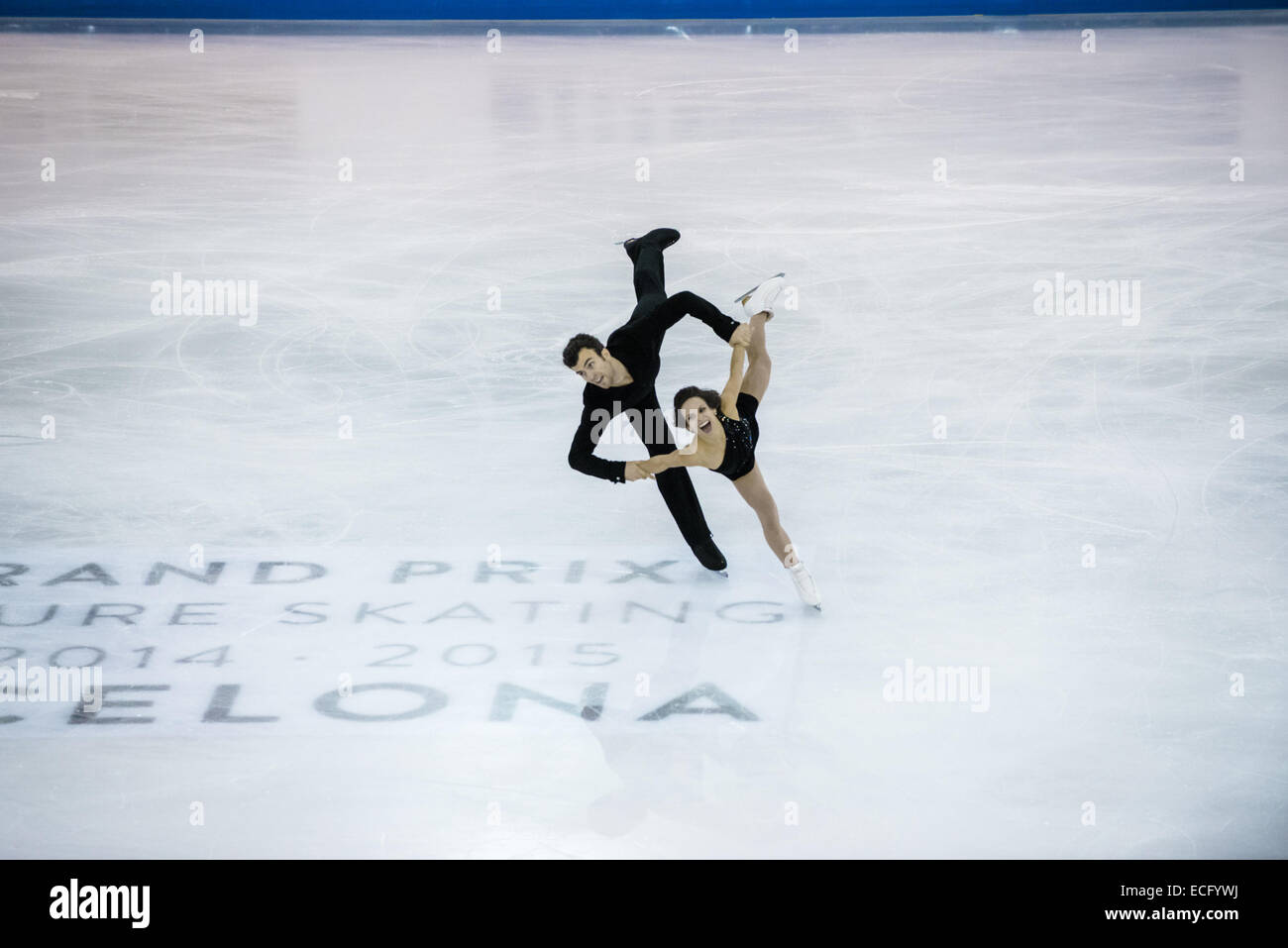 Barcellona, in Catalogna, Spagna. Xiii Dec, 2014. Mondo bronze medalists MEAGAN DUHAMEL / ERIC RADFORD (CAN) eseguire nella coppia Senior - programma gratuito durante il ISU Grand Prix di Pattinaggio di Figura finale di Barcellona © Matthias Oesterle/ZUMA filo/ZUMAPRESS.com/Alamy Live News Foto Stock