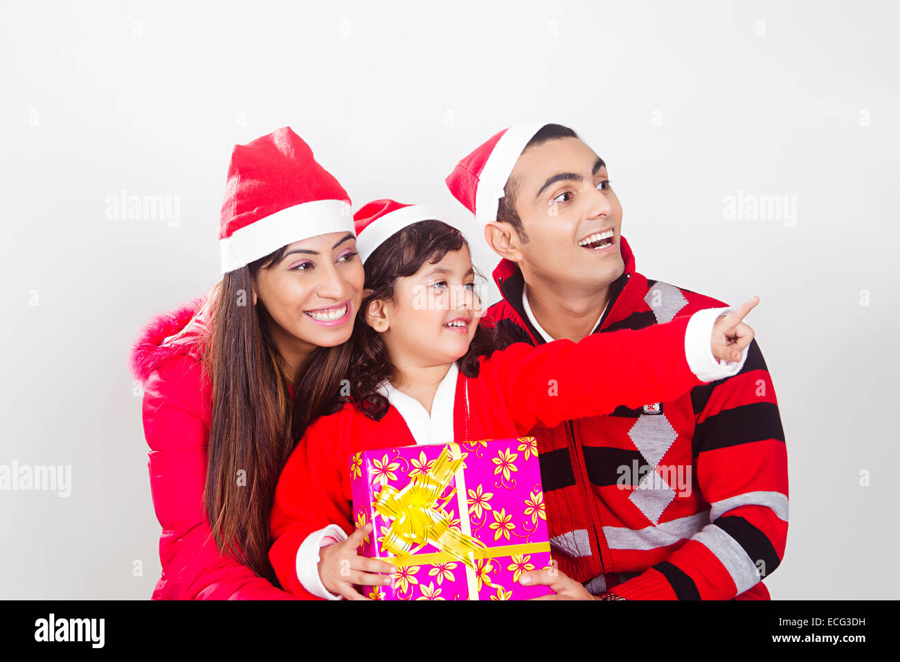 Indian presenta con bambino regali di Natale Foto Stock