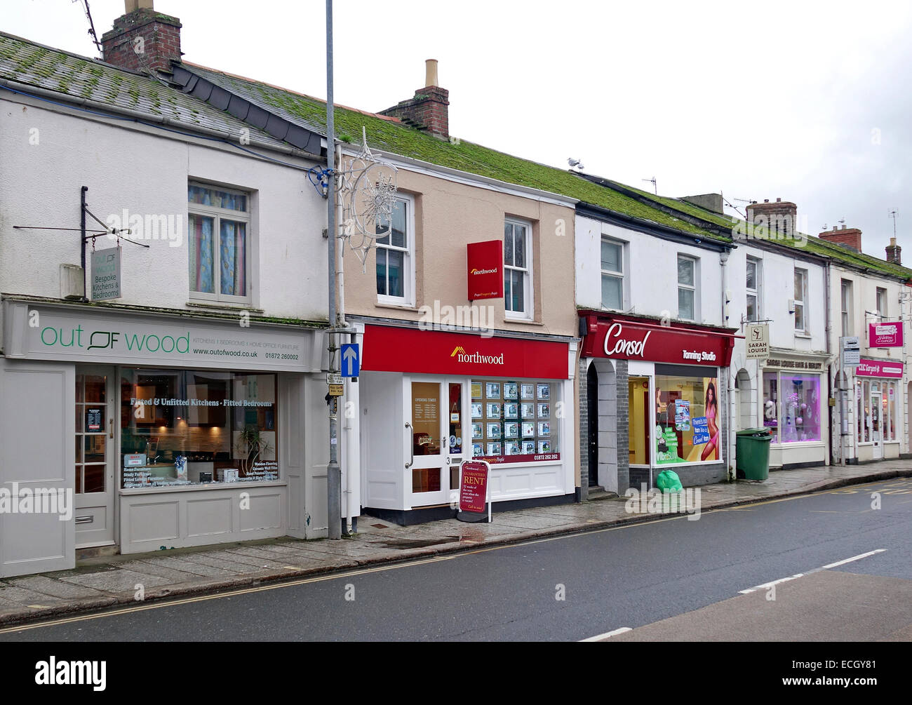 Le piccole imprese a conduzione familiare nel centro della città di truro, Cornwall, Regno Unito Foto Stock