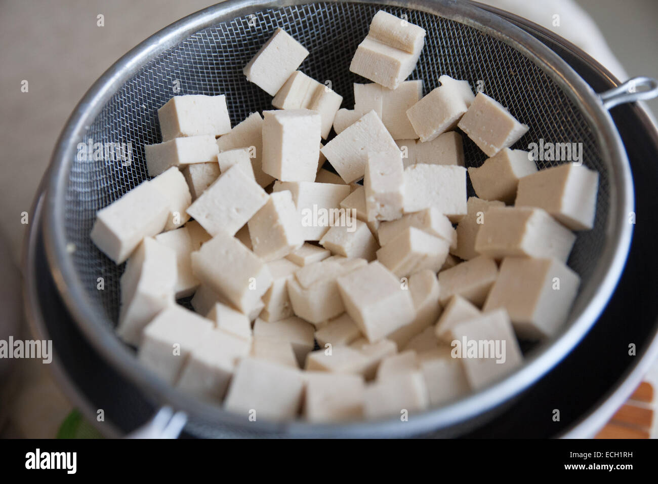 Un trito di tofu Foto Stock