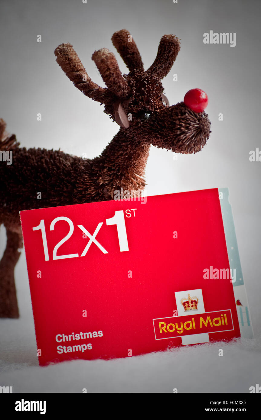 12 x primo /1a classe UK consegna opuscolo. I francobolli natalizi per le cartoline e le lettere per essere inviato in tempo per Natale. Foto Stock