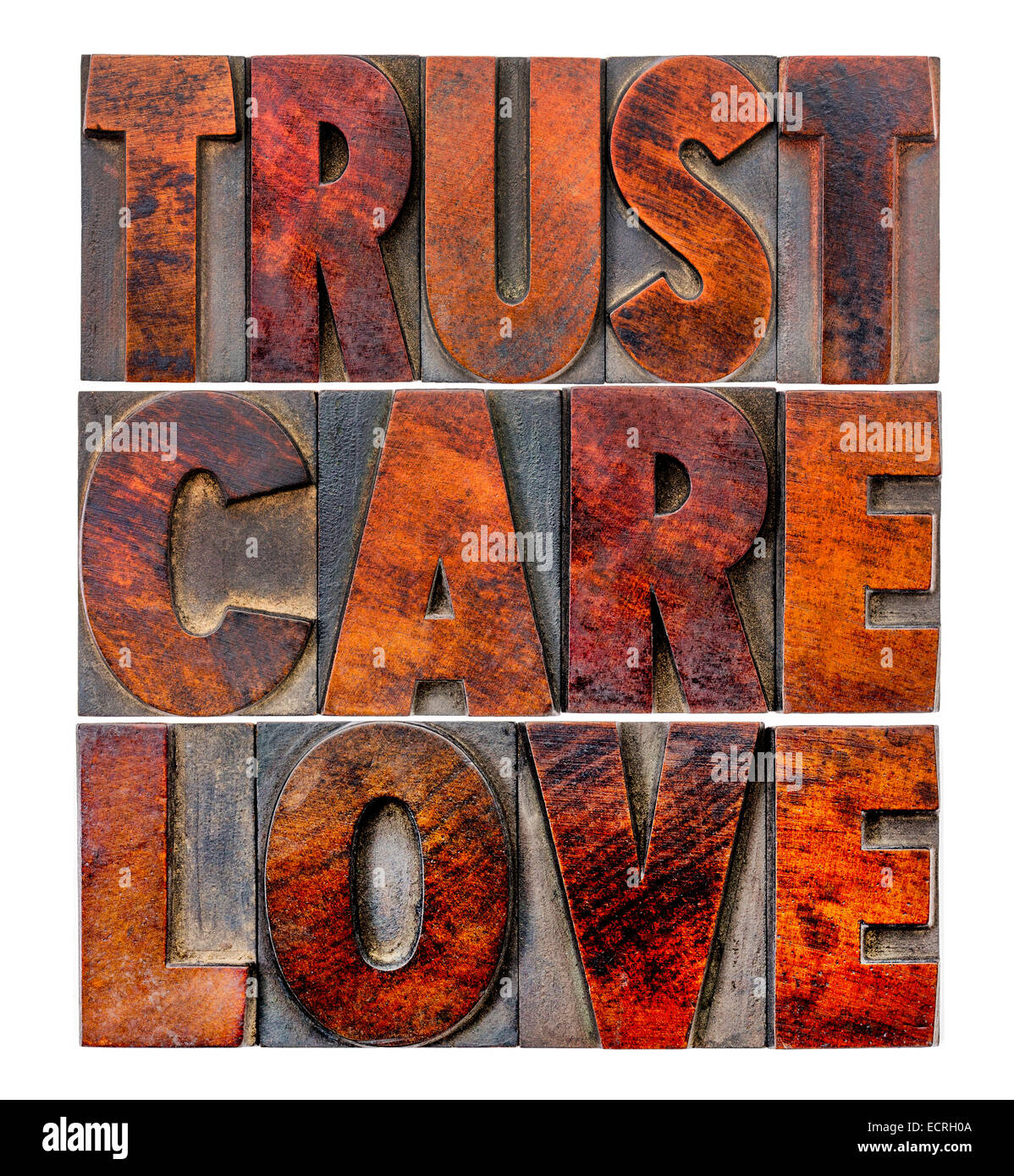 La fiducia, cura, amore - una parola isolata abstract in rilievografia vintage tipo legno Foto Stock