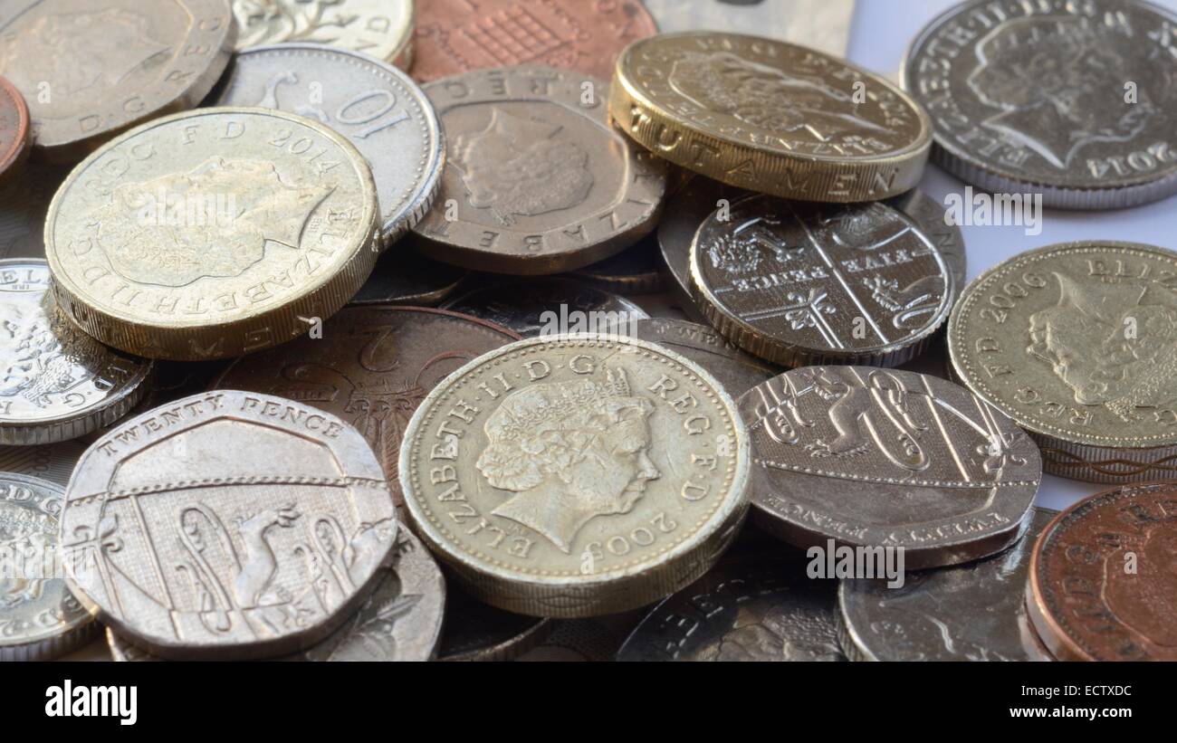 Sterlina inglese il denaro delle monete e delle banconote Foto Stock