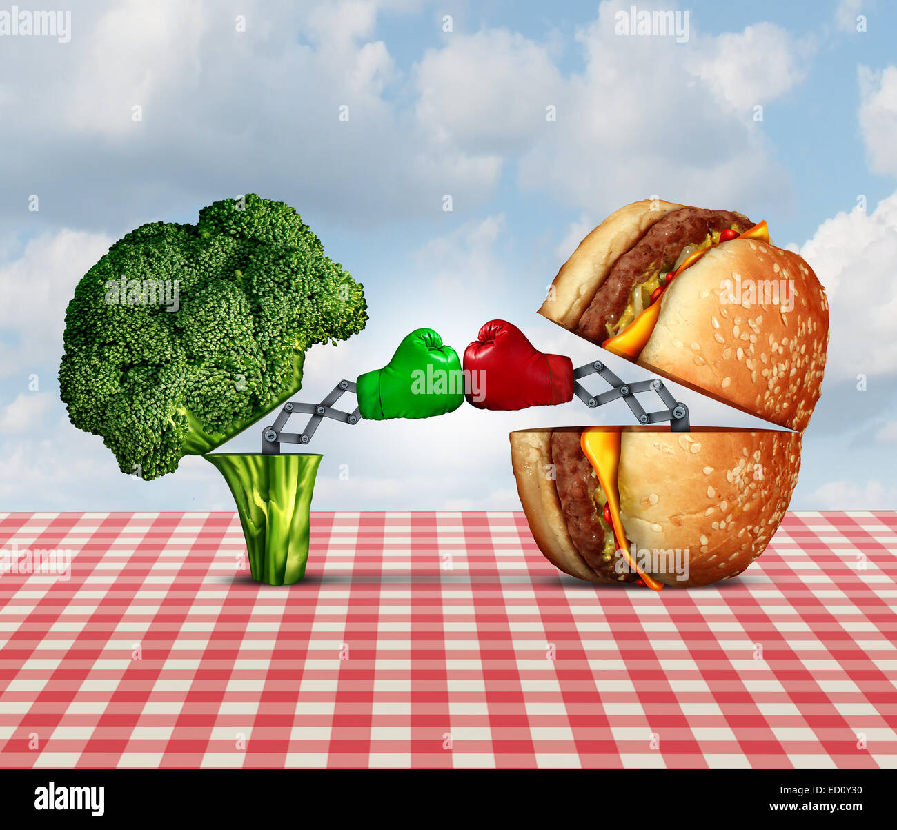 La dieta di battaglia e di lotta alimentare nutrizione nozione come un fresco e salutare i broccoli combattendo una malsana formaggio hamburger con guantoni da pugilato Foto Stock