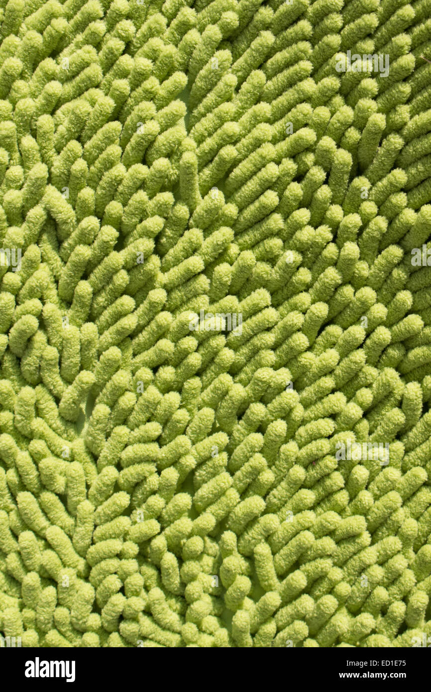 Bellissimi tappeti fabbricati da sintetico sfondo verde. Foto Stock