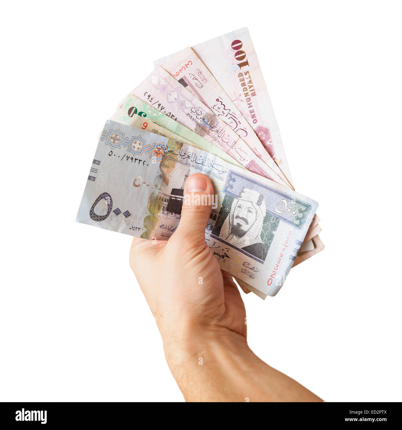 Modern Arabia Saudita denaro, banconote in mano maschio, close up photo isolato su bianco Foto Stock
