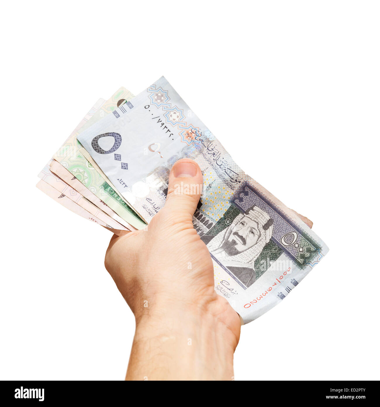 Modern Arabia Saudita denaro, banconote in mano maschio, close-up photo isolato su bianco Foto Stock