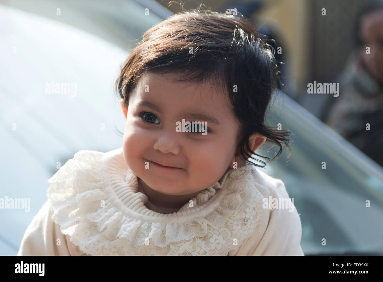 1 bambino indiano Baby sitting car Foto Stock