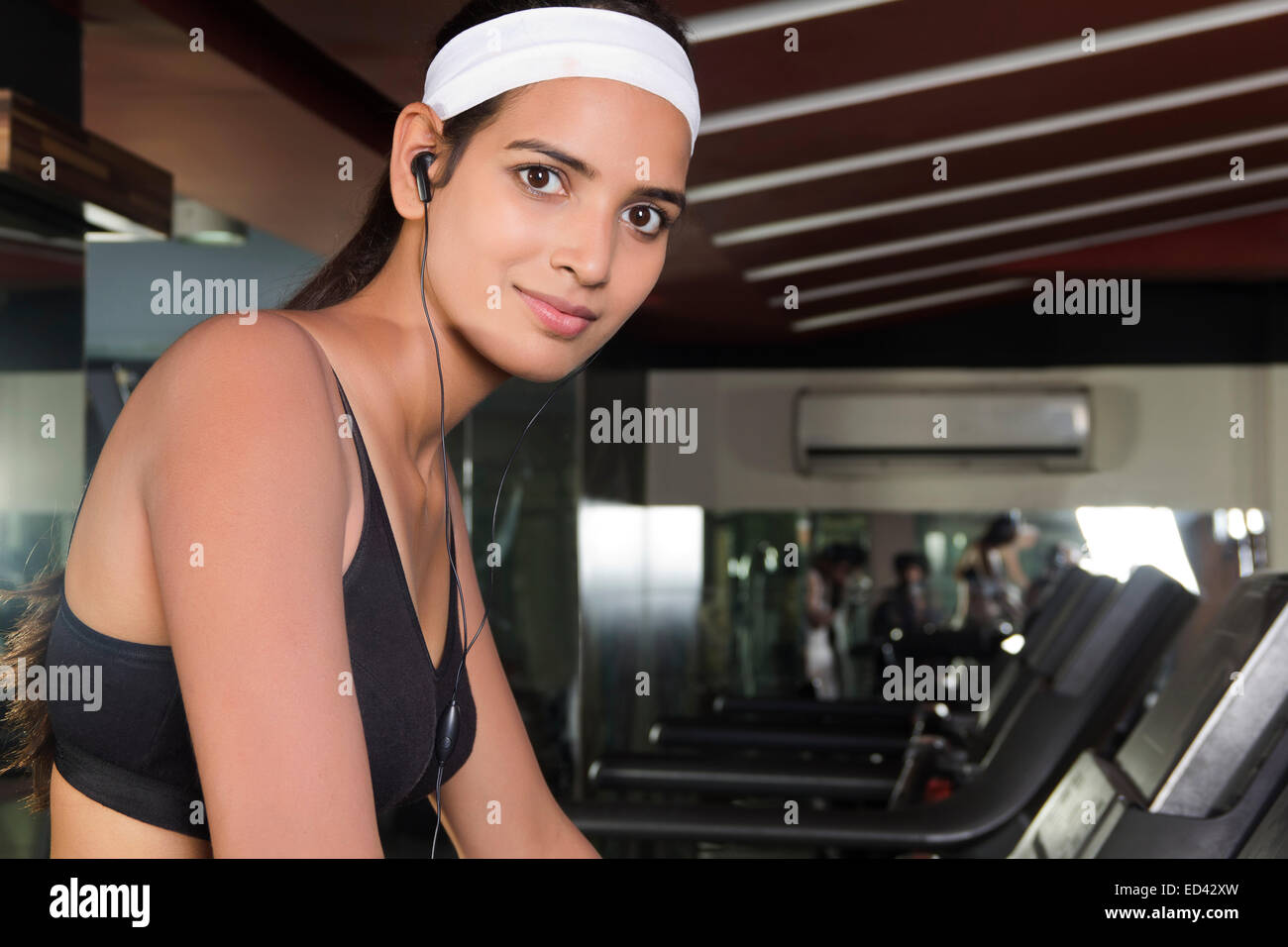 Sport indiano lady mulino del battistrada in esecuzione Foto Stock