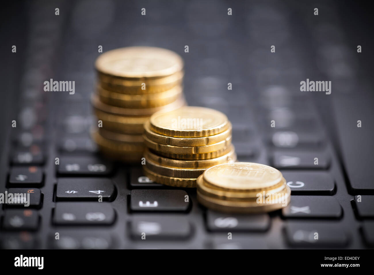 Monete di salita sulla tastiera Foto Stock