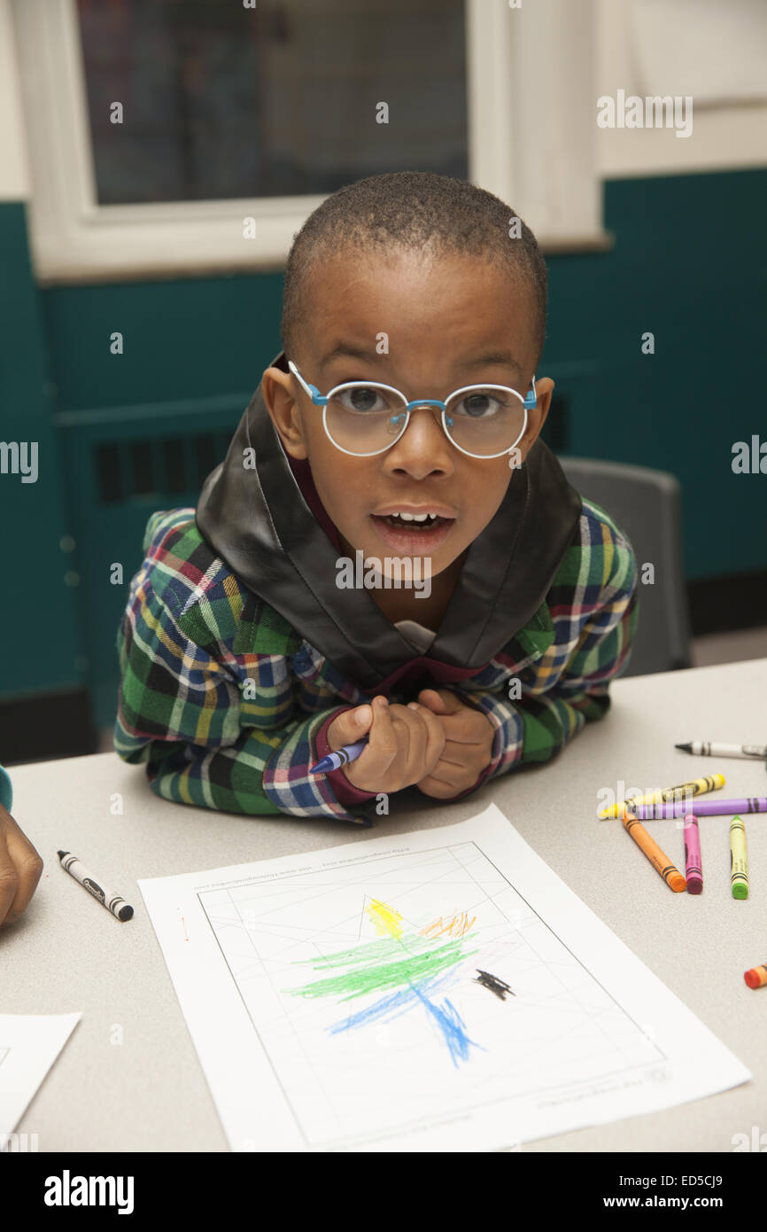 Dopo il programma scolastico dei figli di genitori che lavorano gestito da Henry Stgreet insediamento sul Lower East Side di New York. Foto Stock