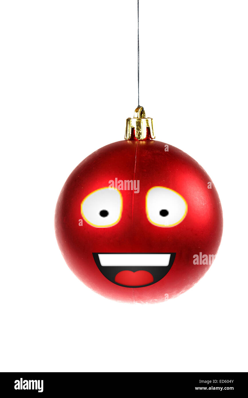 Decorazione di natale con uno smiley animata o illustrato rotondo rosso ornamento per albero di Natale Foto Stock