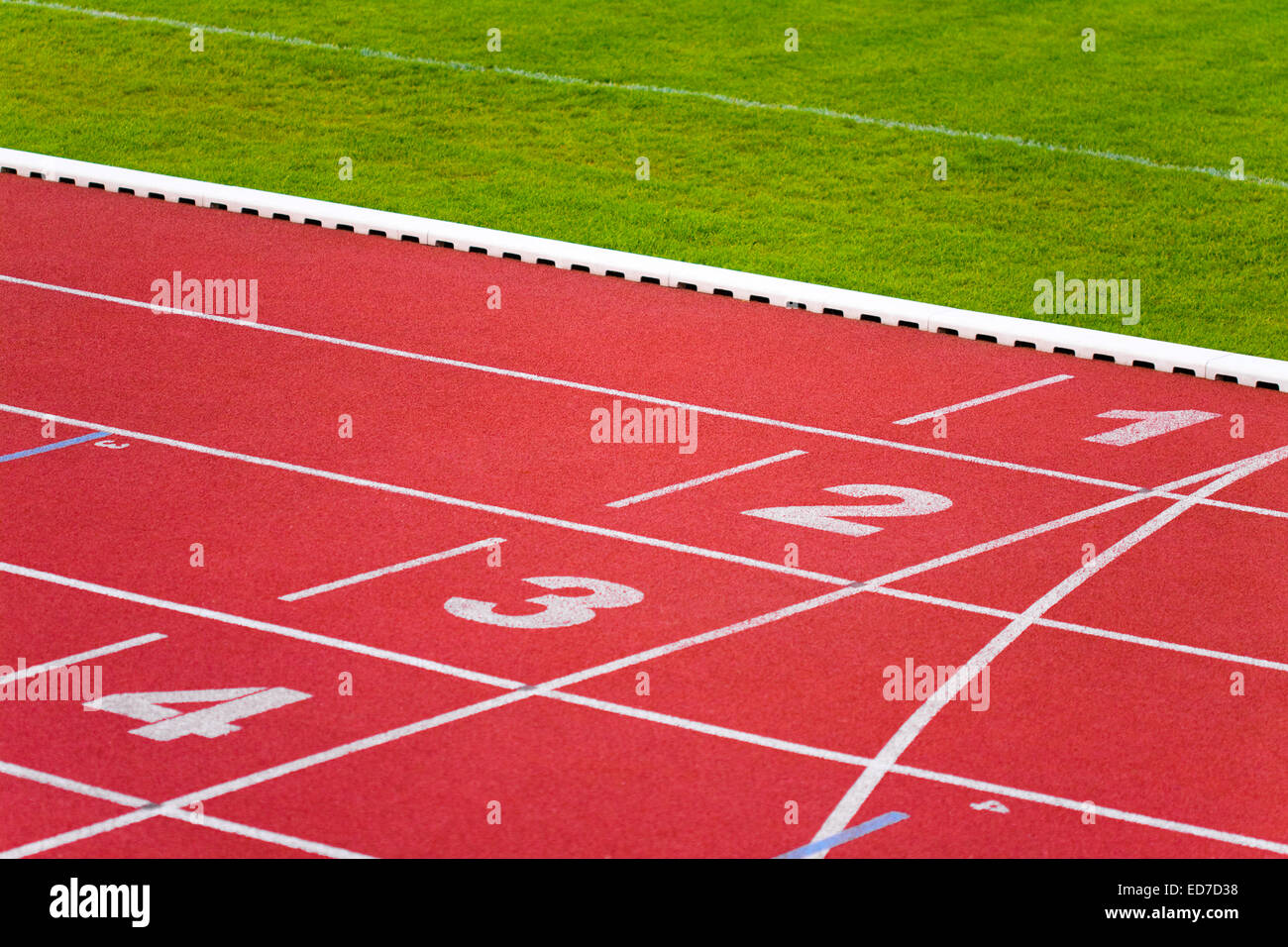I numeri sulla via piste sportive in pista Foto Stock