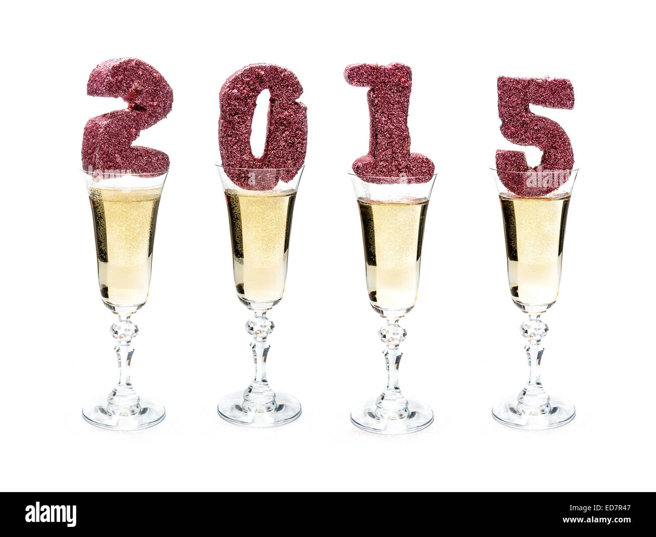 Scintillante 2015 Nuovo anno cifre poste in quattro bicchieri da champagne shot su bianco Foto Stock