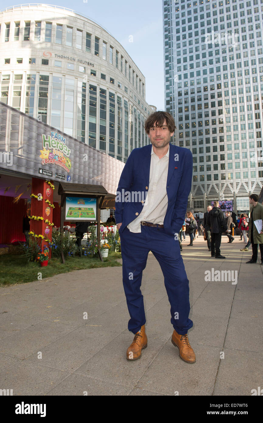 Alex James lanciando la nuova azienda Saga degli eroi gioco a Canary Wharf, Londra. Foto Stock