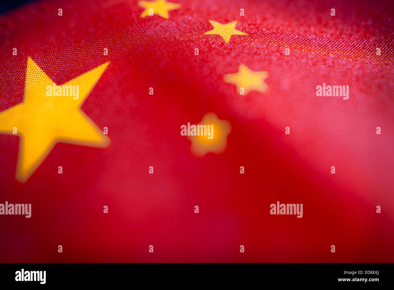 Abstract vista macro di bandiera cinese con profondità di campo ridotta. Foto Stock