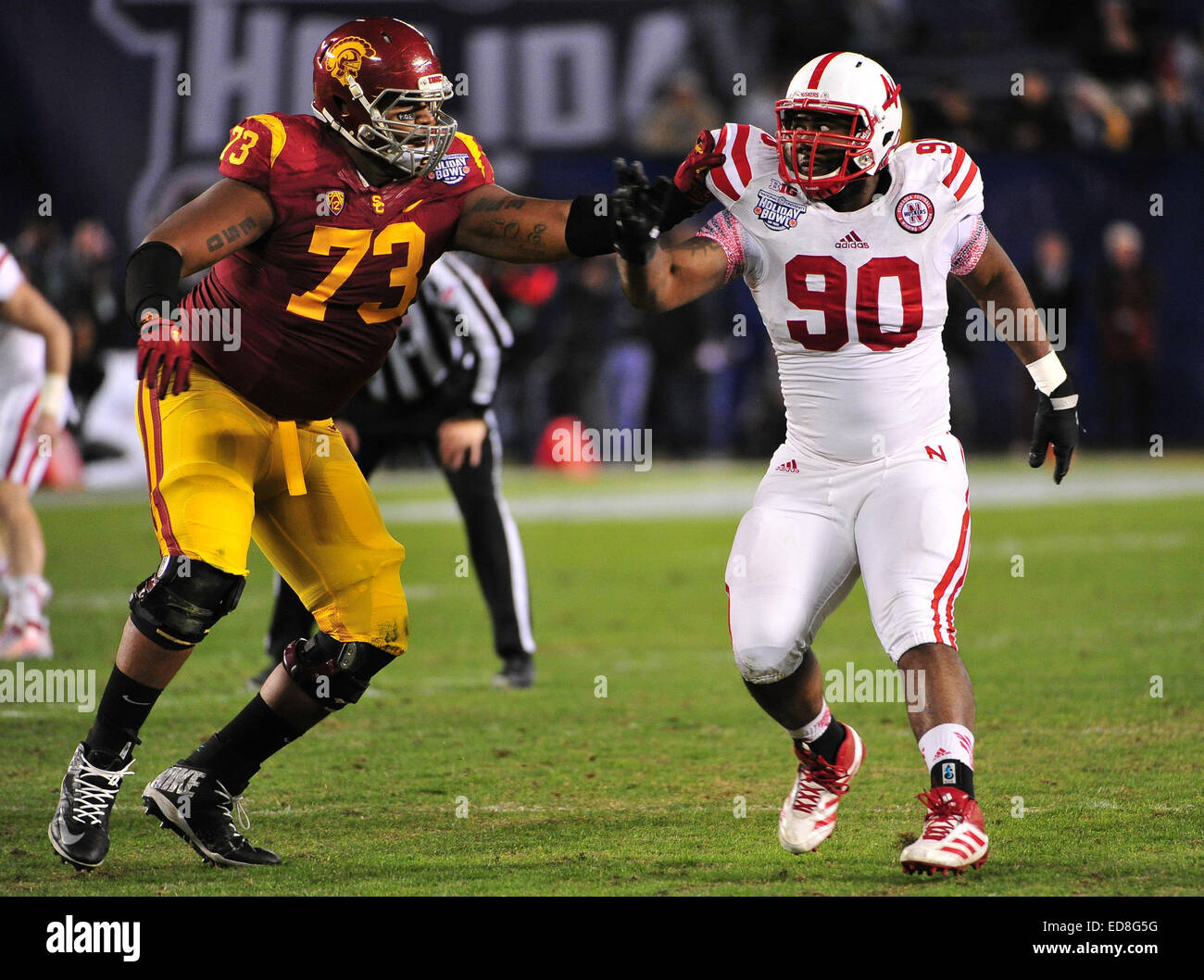 San Diego, CA. 27 dic 2014. Greg McMullen #90 del Nebraska durante l'istruzione di Bridgepoint Holiday Bowl College partita di calcio tra il Nebraska Cornhuskers e l'USC Trojans al Qualcomm Stadium di San Diego, California Giovanni verde/CSM/Alamy Live News Foto Stock