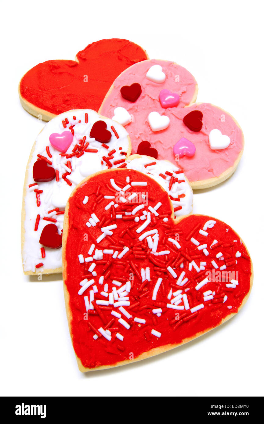 Gruppo di colorate a forma di cuore il giorno di San Valentino i biscotti con la glassa Foto Stock
