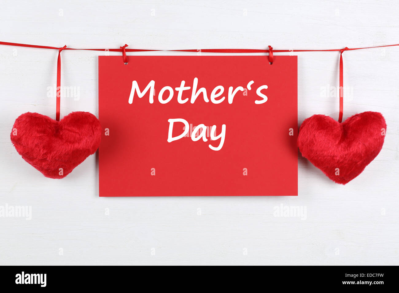 Biglietto di auguri per la festa della mamma con copyspace per il proprio testo e due cuori Foto Stock