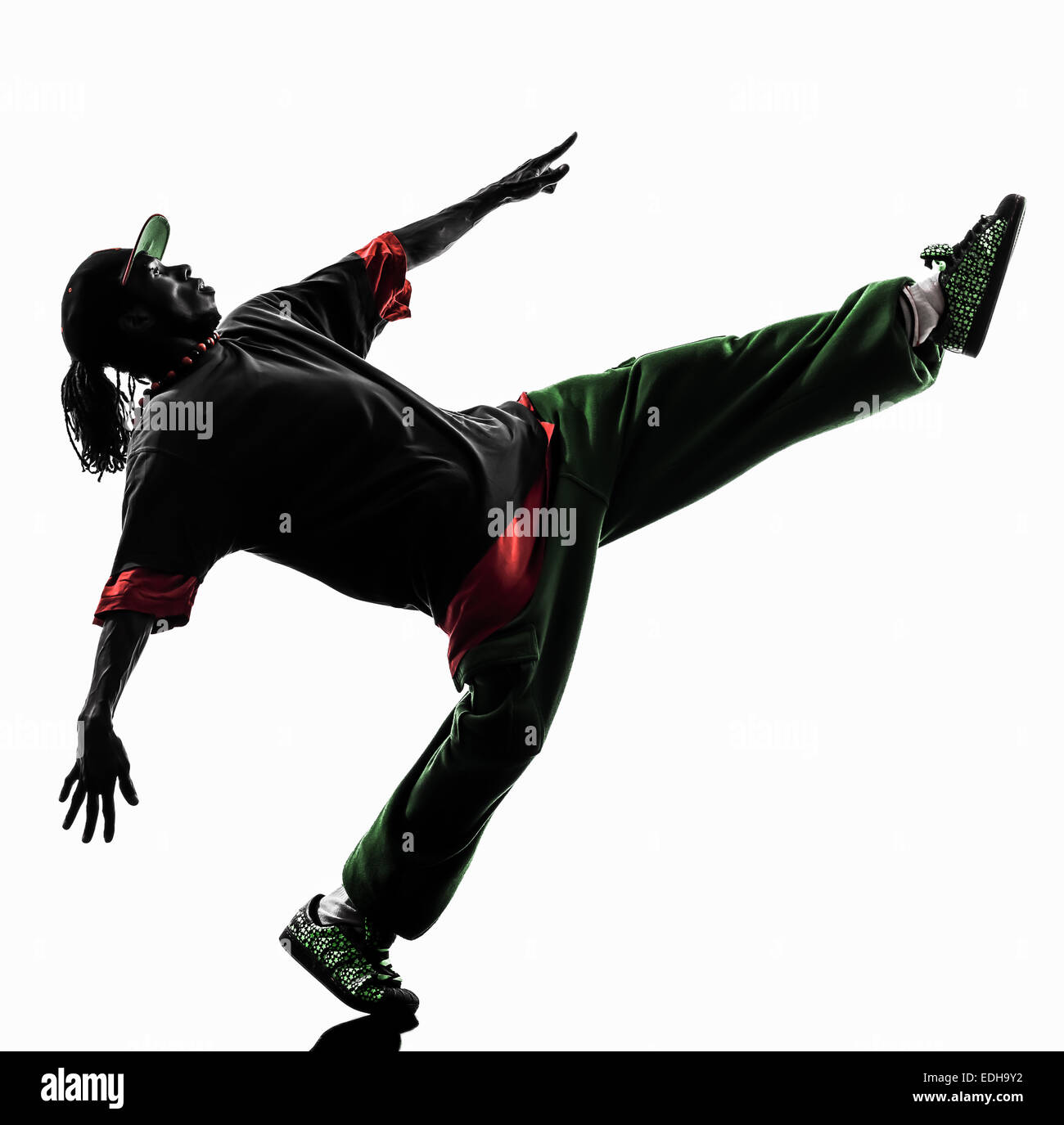 Un hip hop acrobatico ballerino break breakdance giovane silhouette sullo sfondo bianco Foto Stock