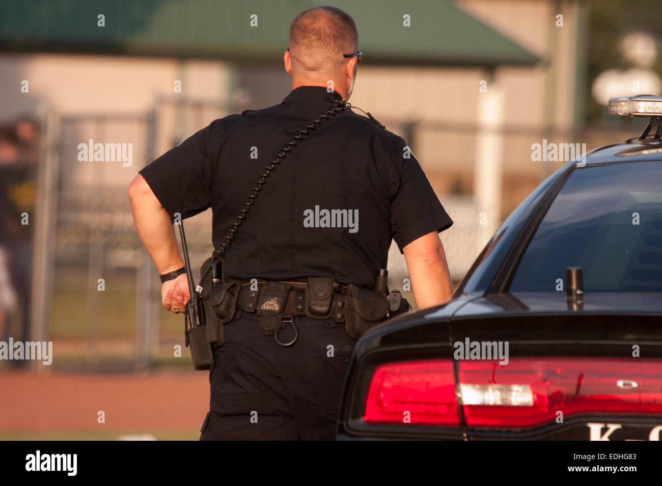 Greenfield Wisconsin il dipartimento di polizia funzionario di polizia in uscita la sua squadra auto Foto Stock
