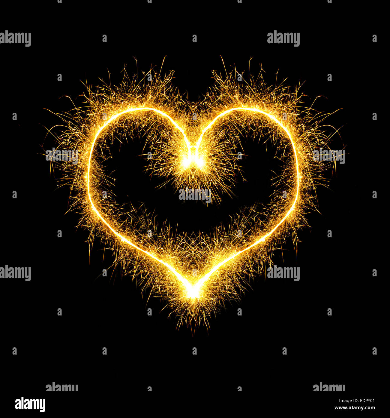 Cuore scintillante su sfondo nero Foto Stock