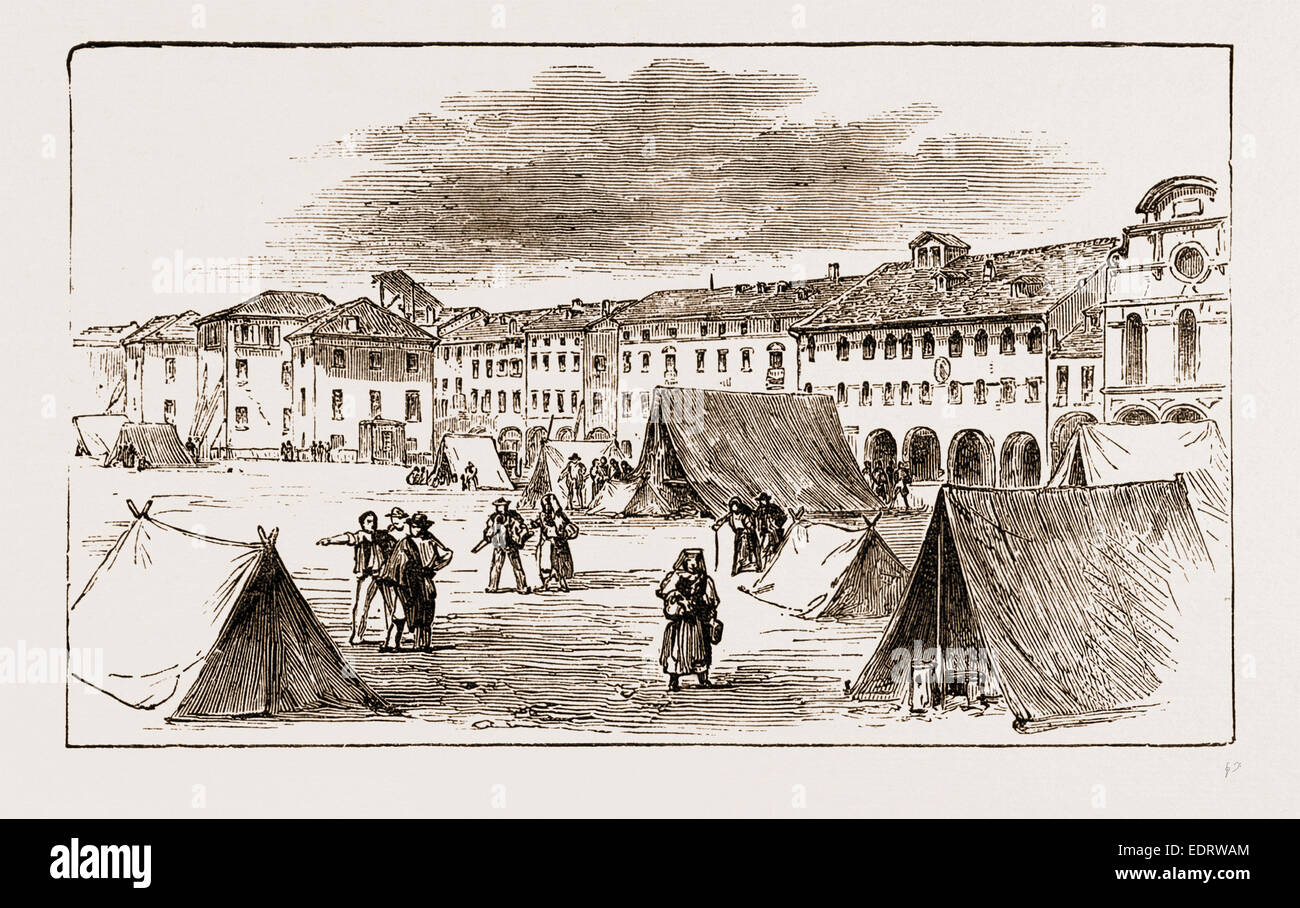 BELLUNO - Piazza Campitelli : gli abitanti a rifugiarsi nelle tende,  Terremoto in Italia 1873 Foto stock - Alamy